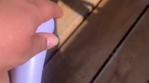 Bbw using toy outside on her porch