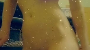 Fit milf rubs lotion on her tight busty beautiful body