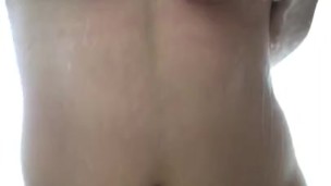 Sexy Latina rubs her body in the shower. 