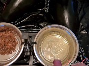 Slave Slut-Orgasma Celeste in black latex eating dog food and drinking piss 2/16