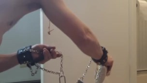 Sub drops the key while kneeling on rice in self bondage
