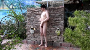Showering outdoors fully nude