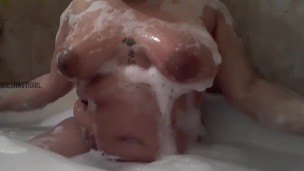 Playing with my breast in a bubble bath (tease)