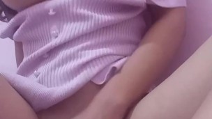 busty in pink rubbing pussy