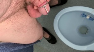 Pissing through a urethra plug - stimulate the flow through penis