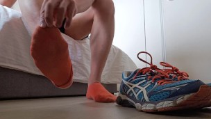 That guy comes home and removes his trainers and socks