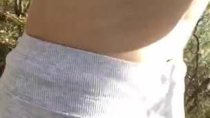 Skinny young slut puts cock in her throat in the forest