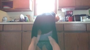 Hot goth tgirl pisses herself doing the dishes