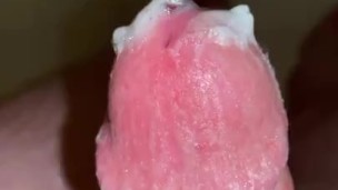 Blowing a massive load with a stroker in the shower