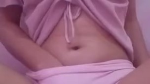 cute little sexy asian teasing in pink outfit