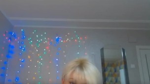Milf shows thong, with a vibrator in her pussy.