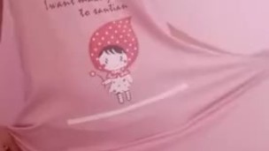 Asian teen showing off cute pink dress for daddy
