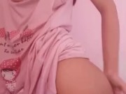 cute little asian in pigtails teasing body and smacking her ass