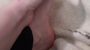  metalhead rubs lotion on her feet