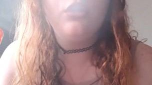 Sexy redhead smoking