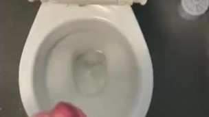 Cruising In public toilets messing with my hard cock with big cumshot 