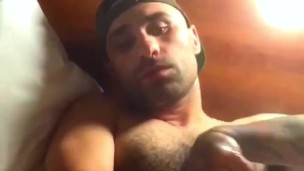 Stroking cock with both hands
