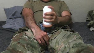 Soldier uses a fleshlight and creampies it