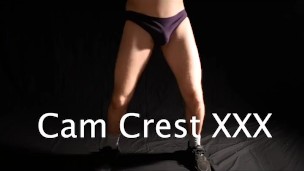 Kettle Bell Workout in a Black Speedo