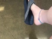 Teasing My mechanic with my stinky feet and dangling flip flop!