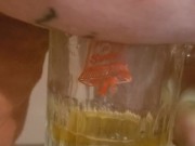 Bbw encouraged to pee more into glass 13/16