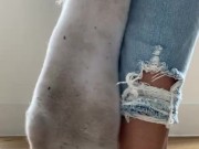 Girl in tight jeans teases you in dirty white sneakers & smelly white socks
