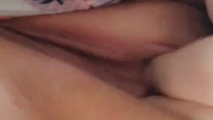Masturbating