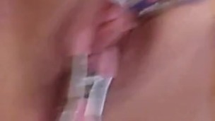 Pussy clinching on benwa balls with clamps on