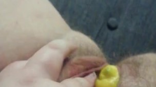 Stuffing my pussy with a lemon