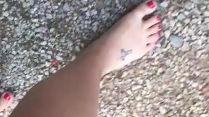 Perfect painted red toes ; walking barefoot outside 