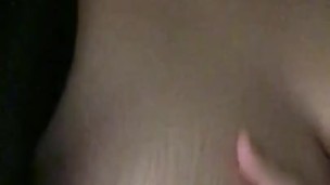 Squeezing my nipple for the camera