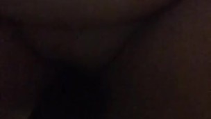 Riding a black dildo 