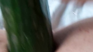 Girl masturbating with big cucumber. Lina Moore