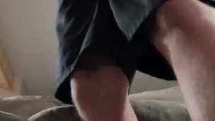 Stroking hard cock with cumshot