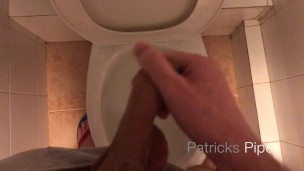 Pissing in a public toilet