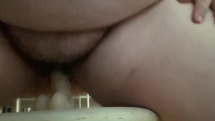 fat bitch with hairy pussy rides dildo. SQUIRT!!