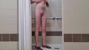 Young transman soapy shower and piss