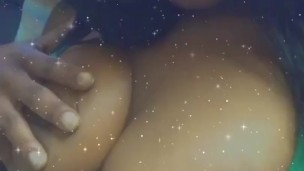 Ebony teases with her natural big tits 