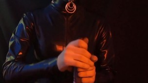 Latex doll with condom hood prepares for shoot