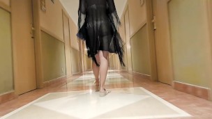 Husband films wife in public walking back to hotel room in bikini
