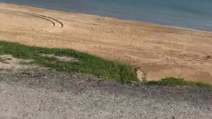 Hard cumshot at beach