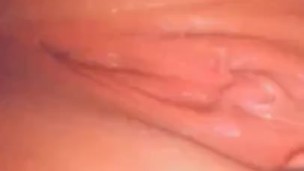 Masturbating