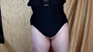 Shemale MILF wears Silicone Female Mask and Swimsuit