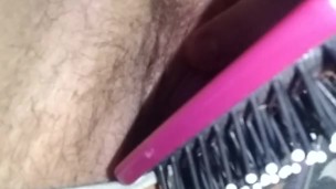 Milf plays with brush