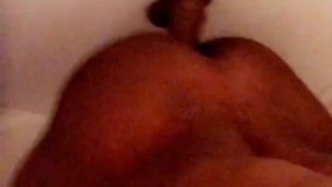 Drew dilating the hole in the shower