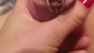 Playing with my slave's useless caged cock