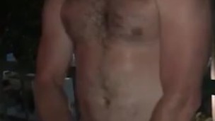 Lane outside stroking his long cock until he shoots his load 