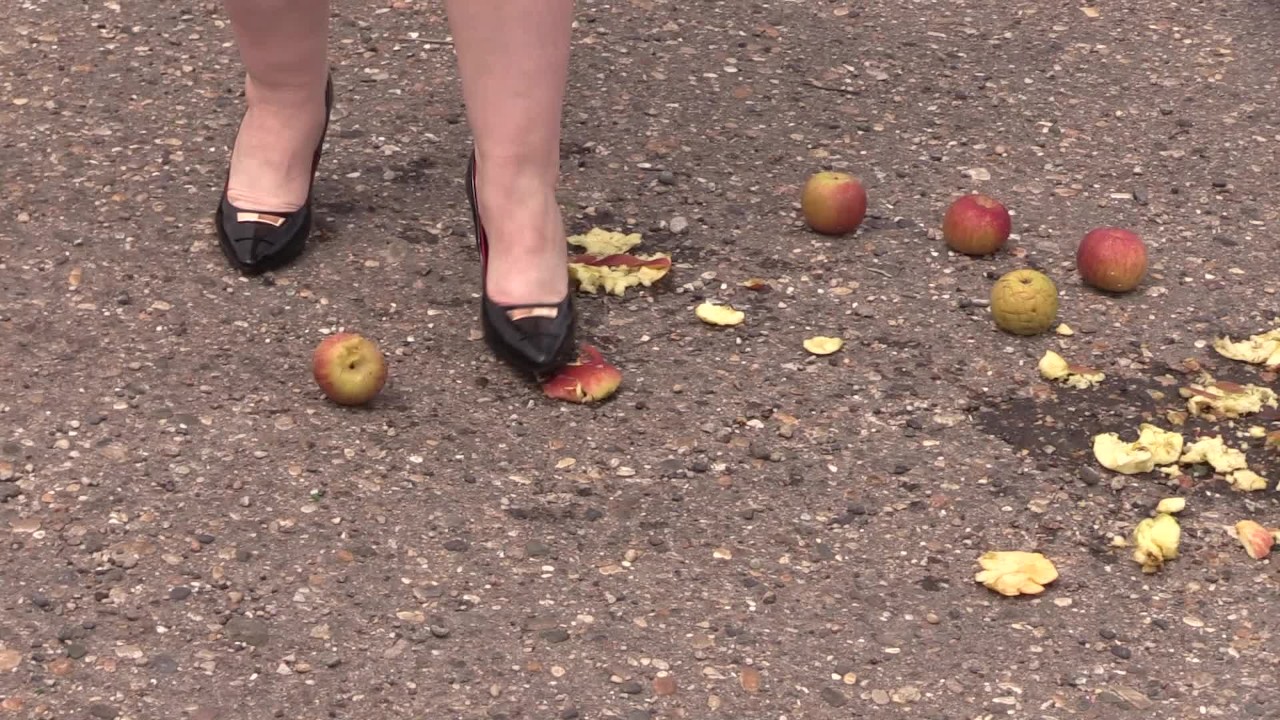 Crush fetish outdoors Fat legs in high heel shoes crush apples