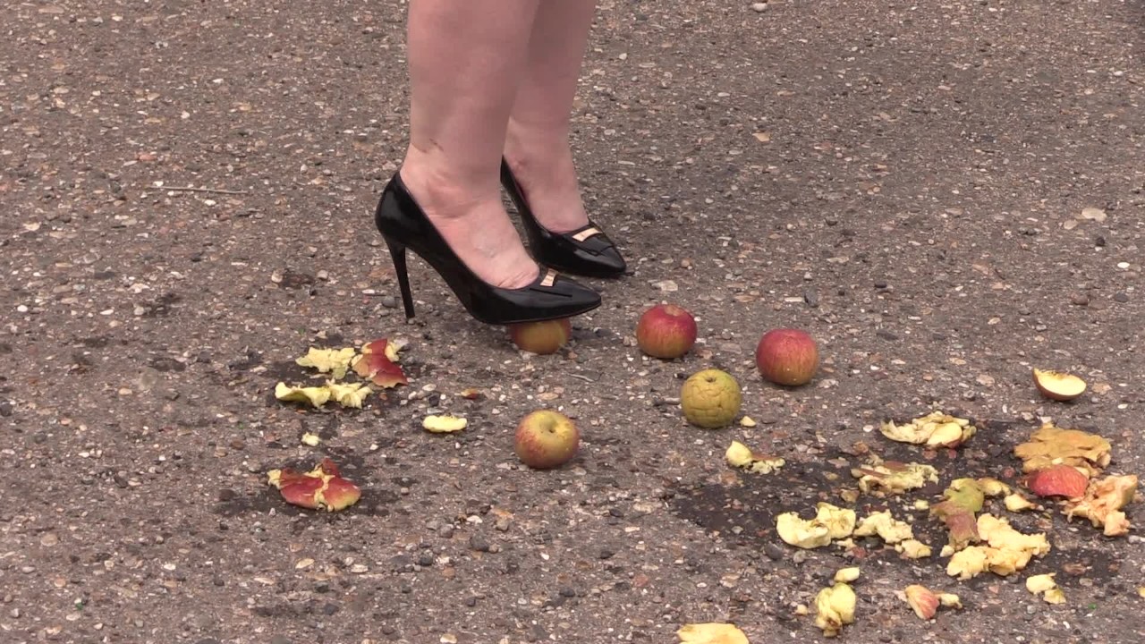 Crush fetish outdoors Fat legs in high heel shoes crush apples