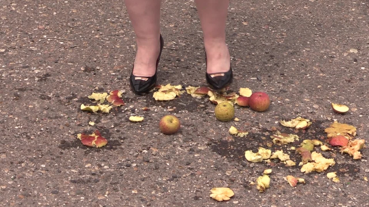 Crush fetish outdoors Fat legs in high heel shoes crush apples